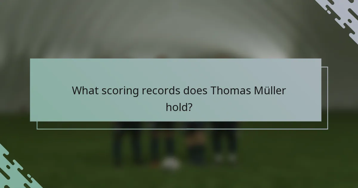 What scoring records does Thomas Müller hold?